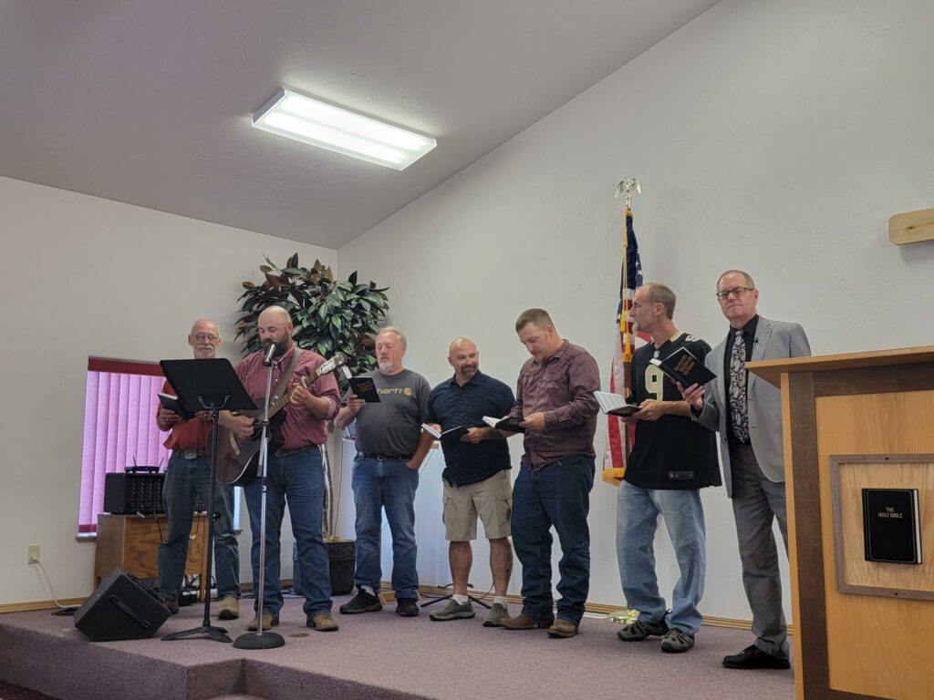 The men of the church sing a special